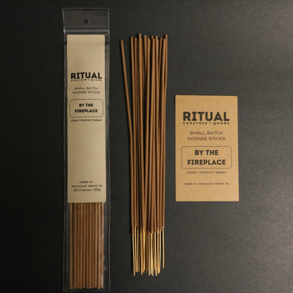 Ritual incense sticks with packaging and label on a dark background