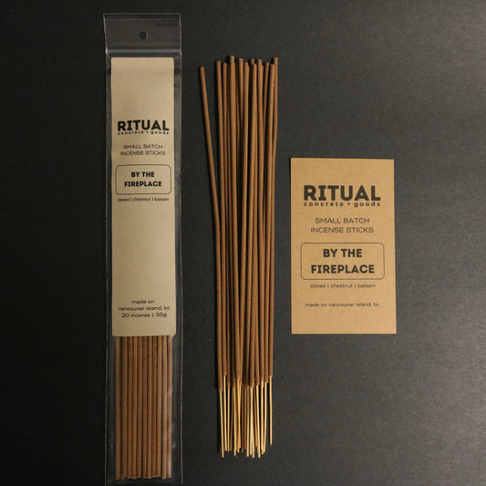 Ritual incense sticks with packaging and label on a dark background