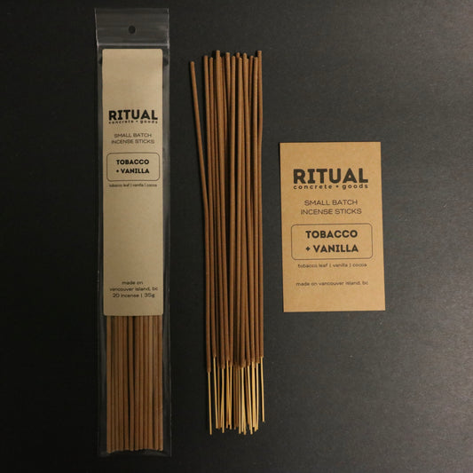 Ritual incense sticks with packaging and label on a dark background